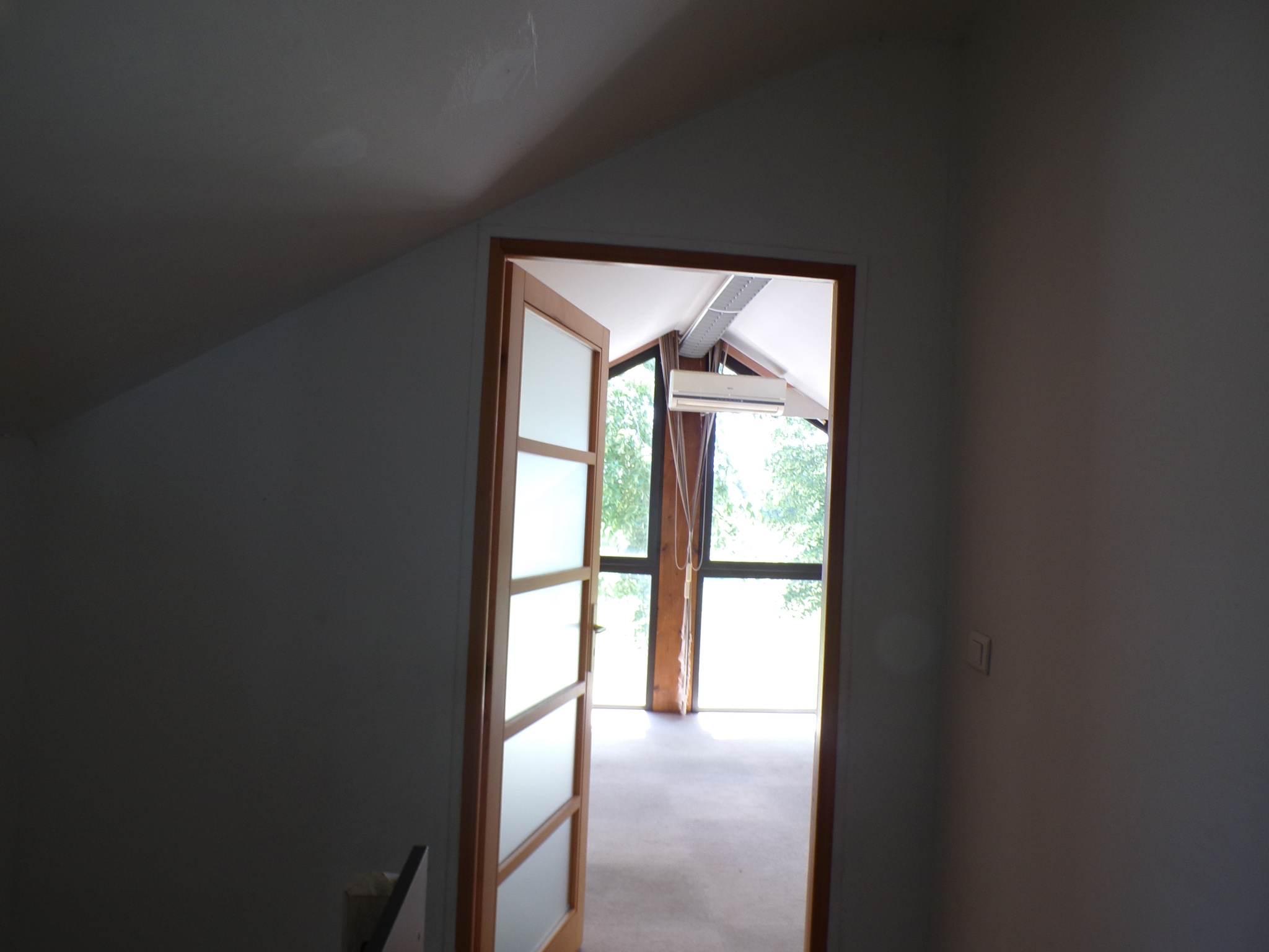 Maison ossature bois avec espace professionnel