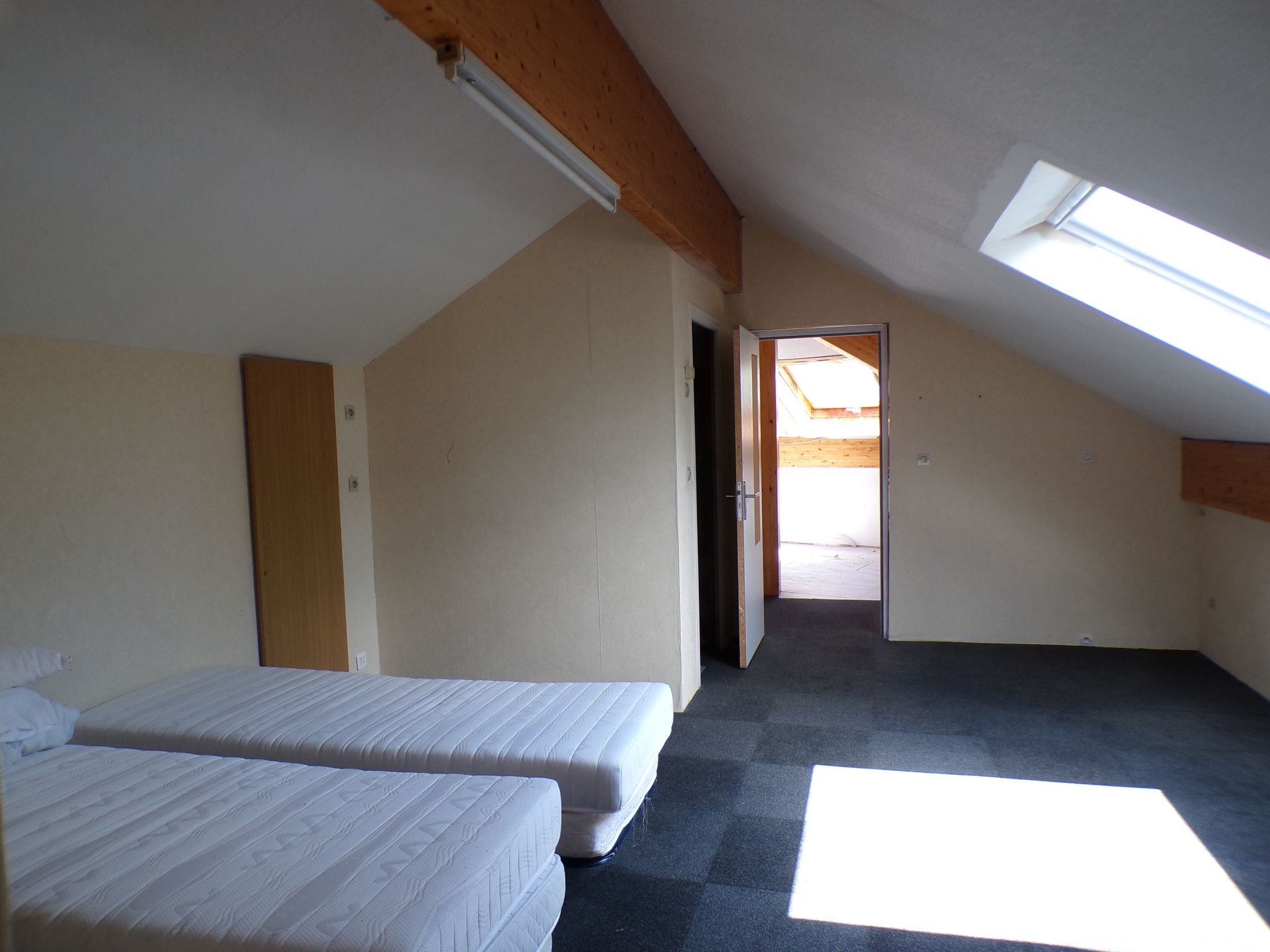 Maison ossature bois avec espace professionnel
