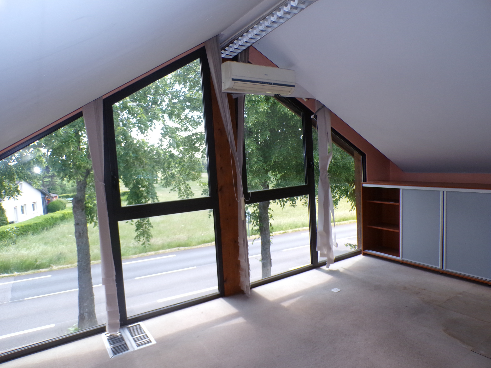 Maison ossature bois avec espace professionnel
