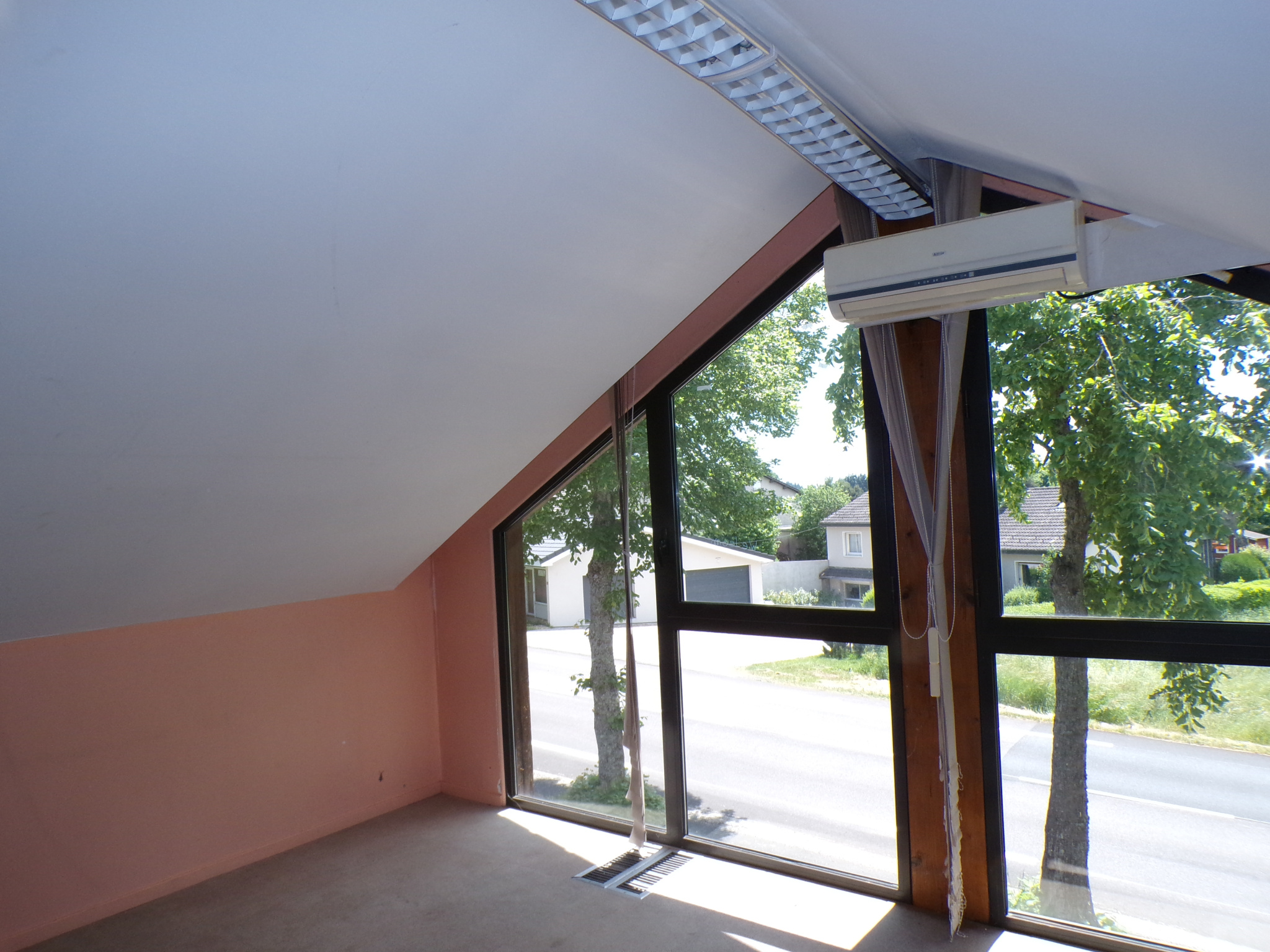 Maison ossature bois avec espace professionnel